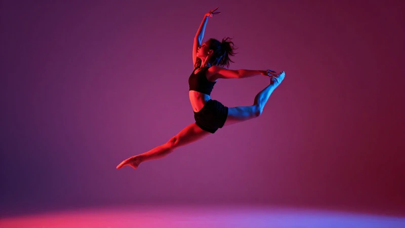 Bailarina dinámica y moderna en pleno salto